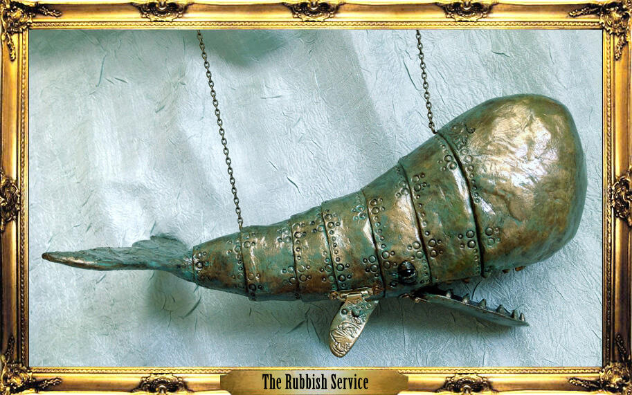 A sculpture of a rusted and corroded bronze steampunk whale with movable flippers and jaw on brass hinges, segmented and riveted all down the body with decorative filigree imprints on the fins. At my old apartment the garbage trucks were so loud, old and