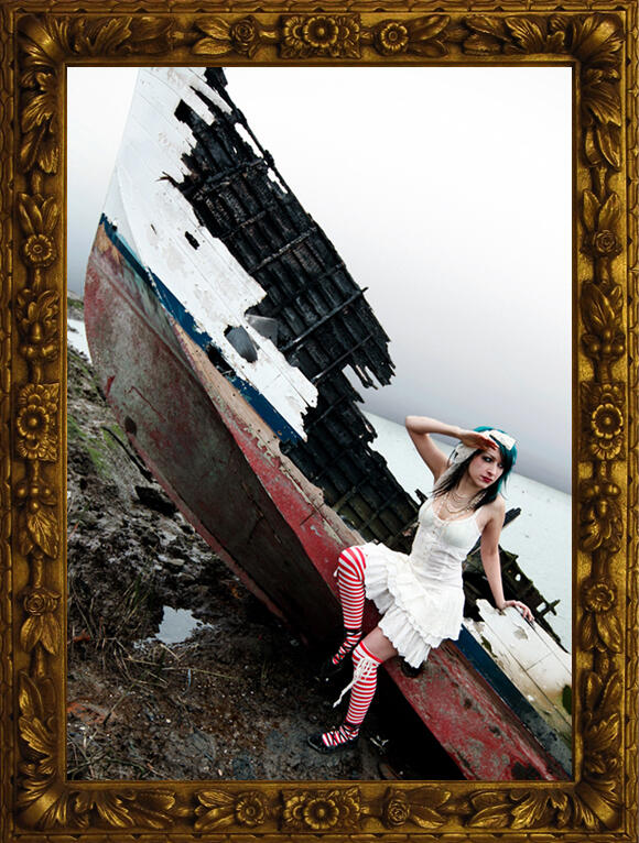 Contact A mysterious individual with turquoise hair, wearing anachronistic cream colored bloomers and a button up dress with striped stockings and ballerina flats laced all around the ankles. A large lace bow is tied in their hair, and multiple strands of beaded
